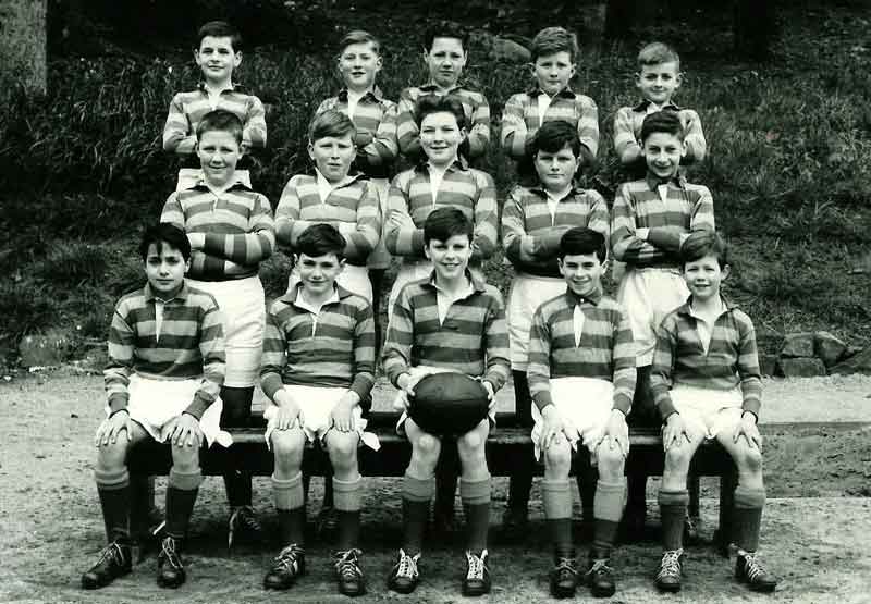 Rubgy-Team-1960.jpg - Back Row - David Pia, Alan Ashton, Robert McLaren, Ian Dunlop, Lenny Oliver Middle Row - Frank Dougan, Chris Kerr, John Ogilvy McDonald, ?, Freddy Dagastino. Front Row - Mark Capaldi, Donald (Wyndham) Smith, Tom Rooney, Leo Doherty, Michael Morrison  Can you fill in the question mark? Let us know.
