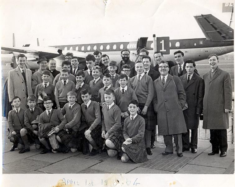 cathedralchoir1.jpg - The Cathedral Choir with some Scotus Boys ready to fly off on tour. "The choir of St Mary's RC Cathedral left Edinburgh to fly to Rome, where they will sing on St Peter's and be received in audience by Pope Paul: They are the sole British representivies at the Fouth International Festival for Male Choirs which is being held at Loreto this week, and are also to take part in an international gala concert in Rome."