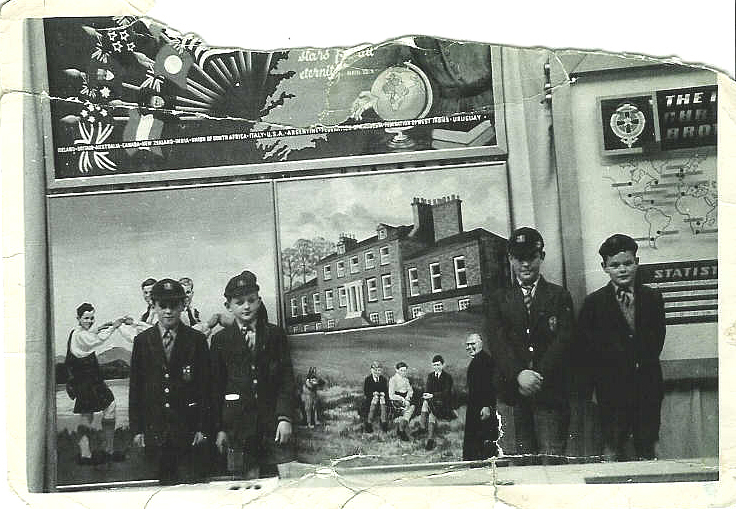 CBs.jpg - This picture looks to have been taken at a Christian Bothers gathering with details of the various schools. Included in the picture is a painting and picture of the school building with the rector and boys in the foreground, also included is the Alsatian, 'Whisky', can you remember what it was called. Can anyone identify the boys in the picture; I think the second from the right is Frank Dougan.