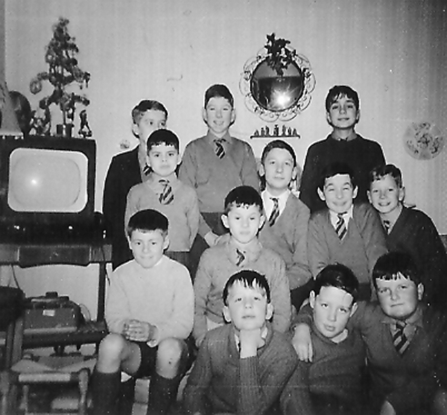 Party.gif - Party at Frank and Maurice Dougan's house, Maurice and Frank in front row.